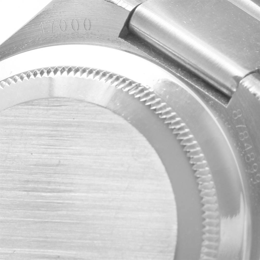 This image shows the back case and bracelet of a Rolex Oysterquartz 17000 Men's Stainless Steel White Dial 17000 Men's Stainless Steel White Dial watch, focusing on the connection point and part of the serial number.