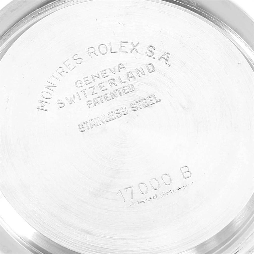 The image shows the inside case back of a Rolex Oysterquartz 17000 Men's Stainless Steel White Dial 17000 Men's Stainless Steel White Dial watch, featuring engravings with model details.
