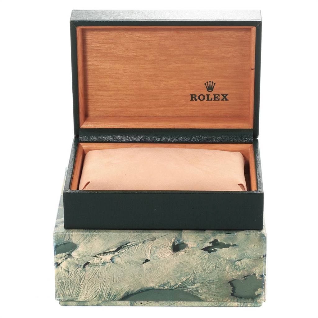 An open box with a cushion for the Rolex Oysterquartz 17013 Men's Steel and Gold (two tone) White Dial 17013 Men's Steel and Gold (two tone) White Dial watch is shown from the front angle.