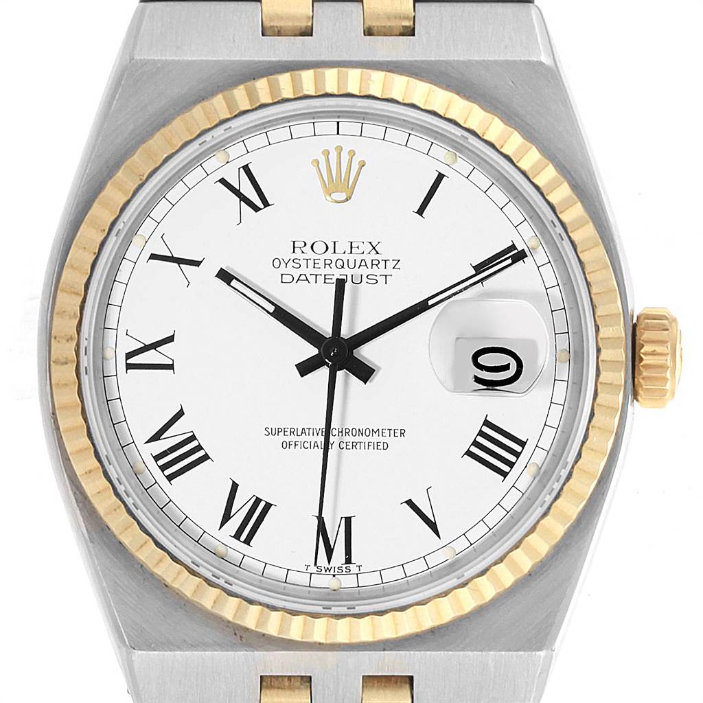 This image shows a front view of a Rolex Oysterquartz 17013 Men's Steel and Gold (two tone) White Dial 17013 Men's Steel and Gold (two tone) White Dial watch, highlighting the dial, hands, bezel, and date window.