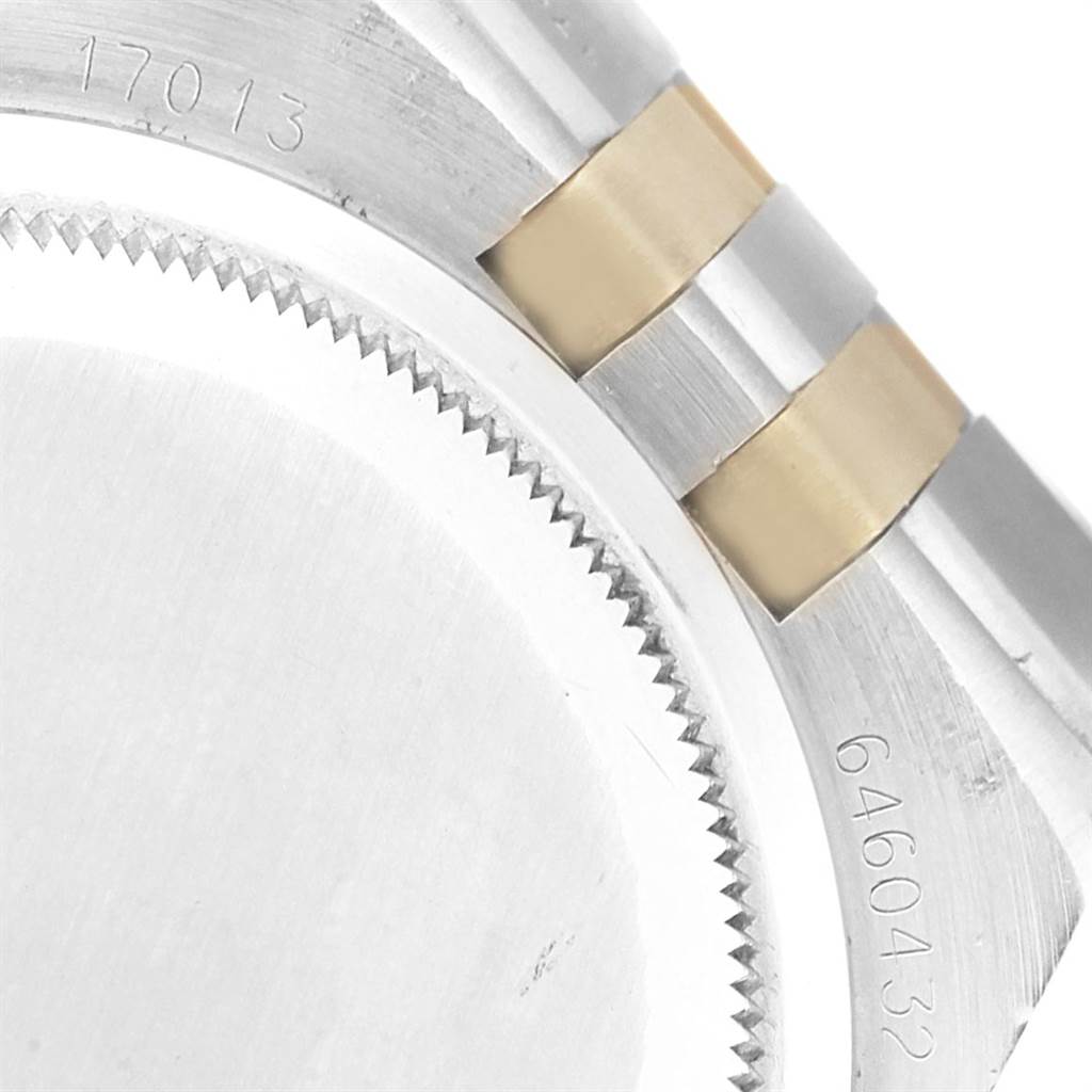 The image shows a close-up of the bezel, casing, and bracelet links with model numbers on the Rolex Oysterquartz 17013 Men's Steel and Gold (two tone) White Dial 17013 Men's Steel and Gold (two tone) White Dial watch.