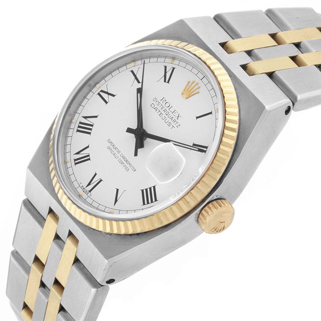 This Rolex Oysterquartz 17013 Men's Steel and Gold (two tone) White Dial 17013 Men's Steel and Gold (two tone) White Dial watch is shown at a slight angle, highlighting the dial, bezel, crown, and bi-metal bracelet.