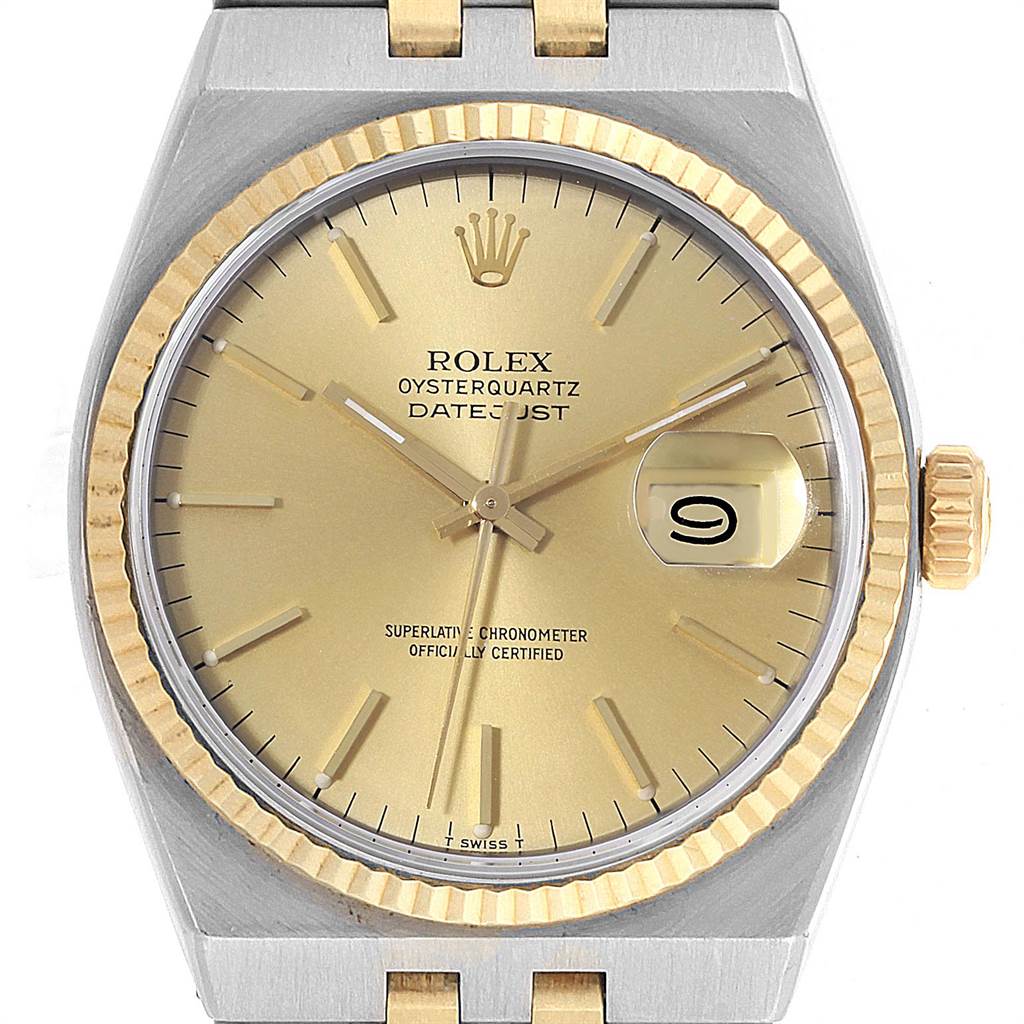 The image shows a close-up front view of a Rolex Oysterquartz 17013 Men
s Stainless Steel Champagne Dial 17013 Men
s Stainless Steel Champagne Dial Datejust watch, highlighting its dial, crown, and bezel.
