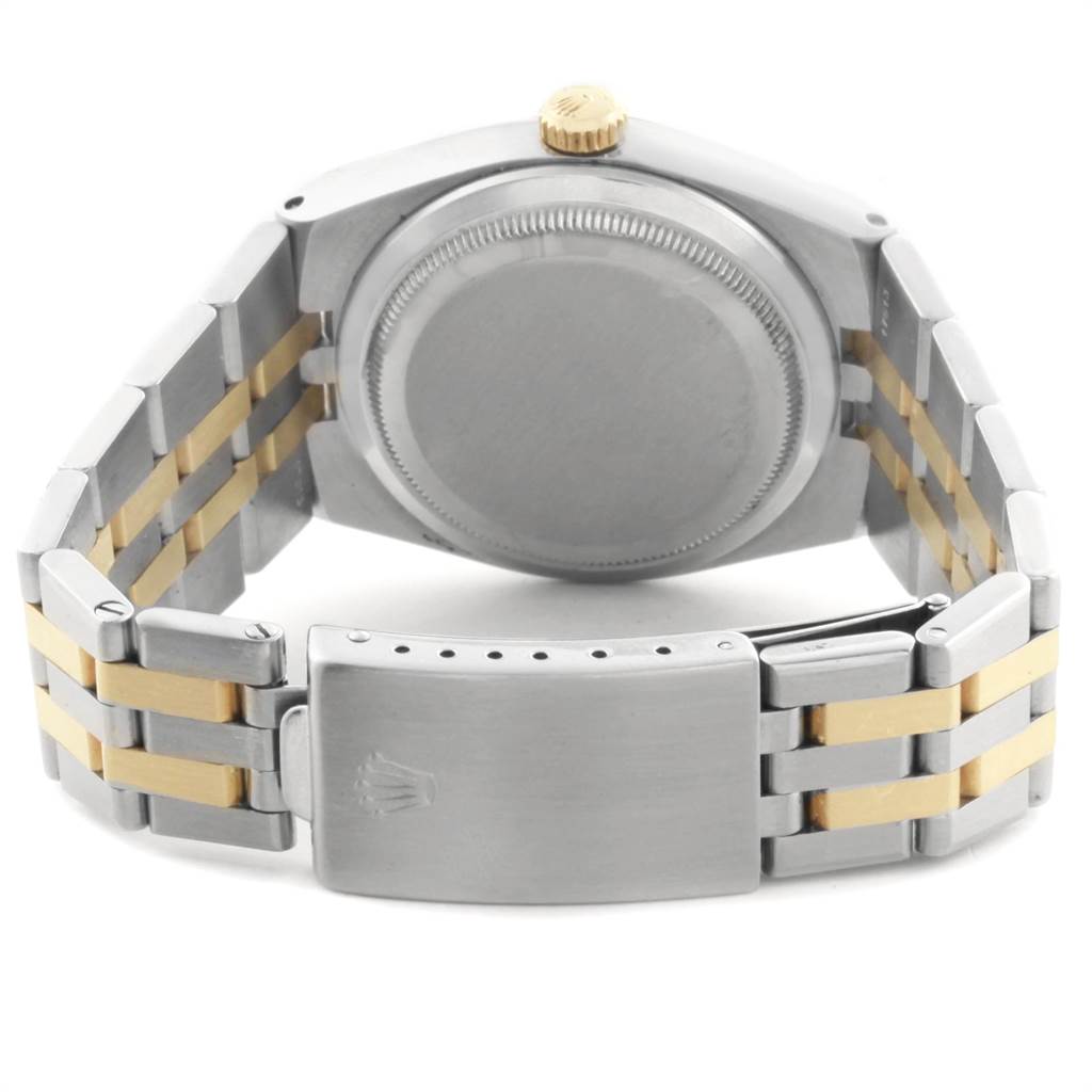 The image shows the back case and bracelet of a Rolex Oysterquartz 17013 Men
s Stainless Steel Champagne Dial 17013 Men
s Stainless Steel Champagne Dial watch viewed from behind.