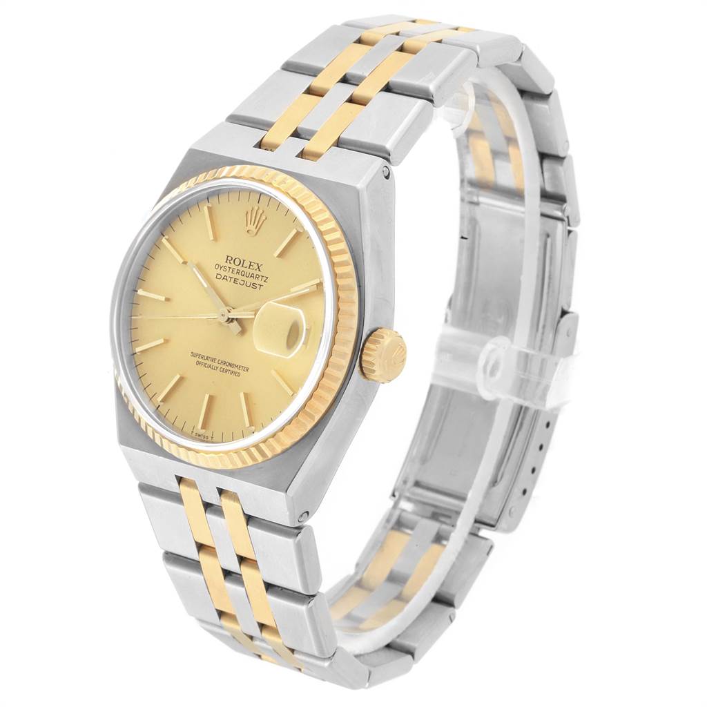 This image shows a Rolex Oysterquartz 17013 Men
s Stainless Steel Champagne Dial 17013 Men
s Stainless Steel Champagne Dial Datejust watch at an angled view, displaying the watch face, case, bezel, and bracelet.