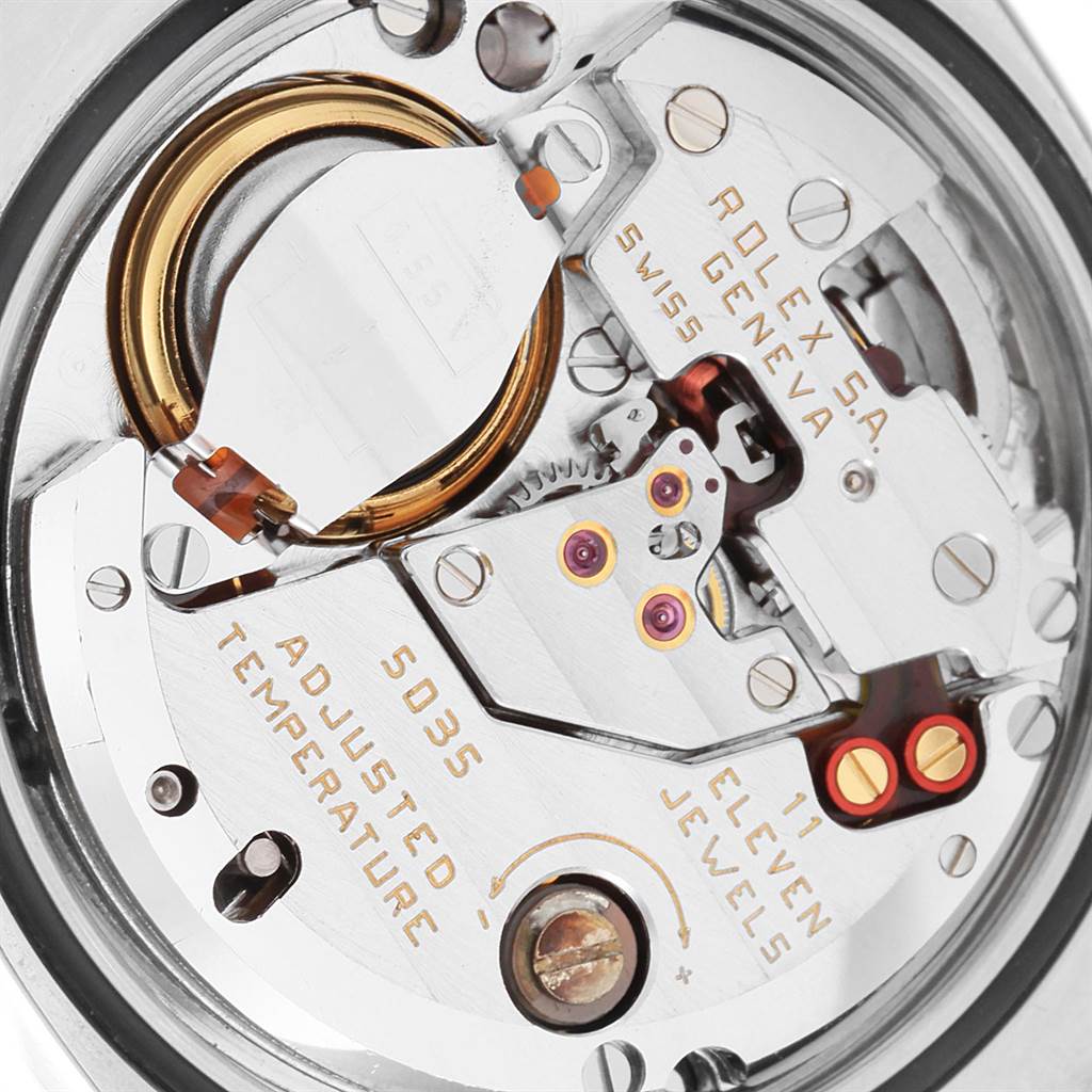 This image shows a close-up view of the movement and internal components of a Rolex Oysterquartz 17013 Men
s Stainless Steel Champagne Dial 17013 Men
s Stainless Steel Champagne Dial watch.