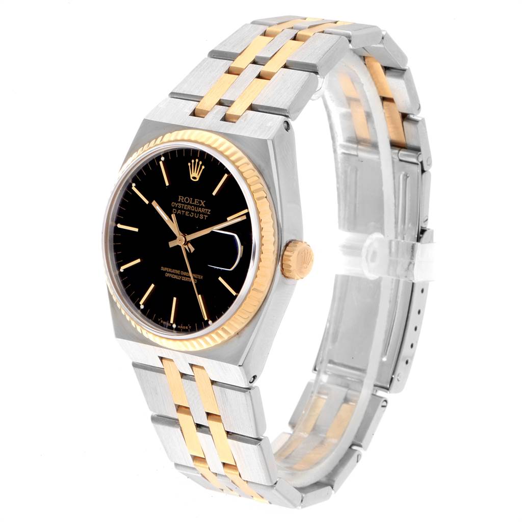 The Rolex Oysterquartz 17013 Men
s Stainless Steel Black Dial 17013 Men
s Stainless Steel Black Dial model is shown at an angle highlighting the watch face, crown, and two-tone bracelet.