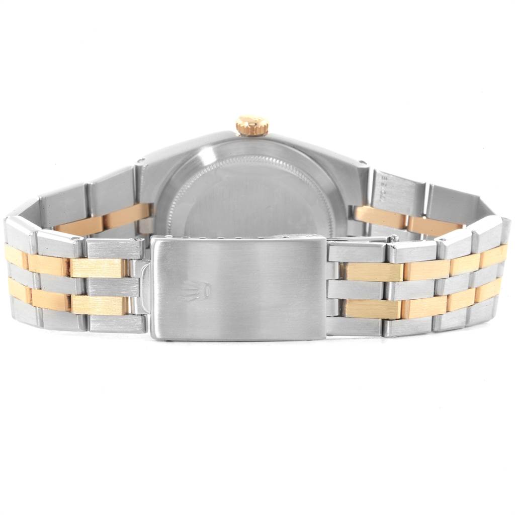 The image shows the back view of the Rolex Oysterquartz 17013 Men
s Stainless Steel Black Dial 17013 Men
s Stainless Steel Black Dial watch, highlighting the case back, crown, and bracelet clasp.