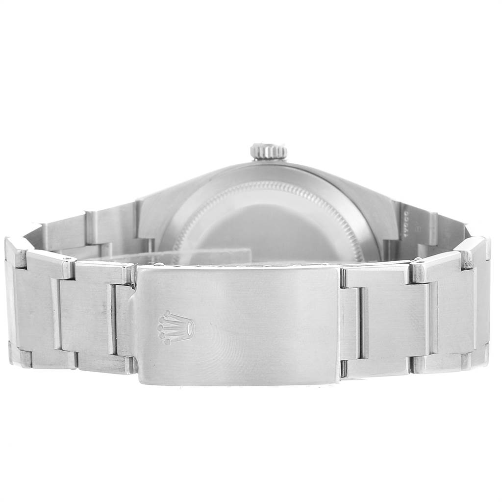 The image shows the back and bracelet clasp of the Rolex Oysterquartz 17000 Men's Stainless Steel White Dial 17000 Men's Stainless Steel White Dial watch.