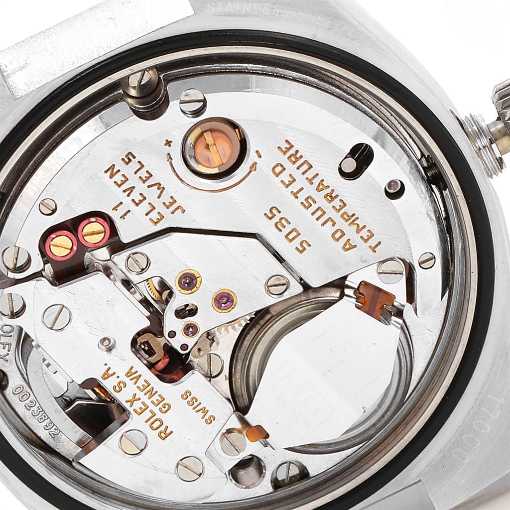 This image shows a close-up view of the internal mechanism of a Rolex Oysterquartz 17000 Men's Stainless Steel White Dial 17000 Men's Stainless Steel White Dial model, highlighting its intricate components.