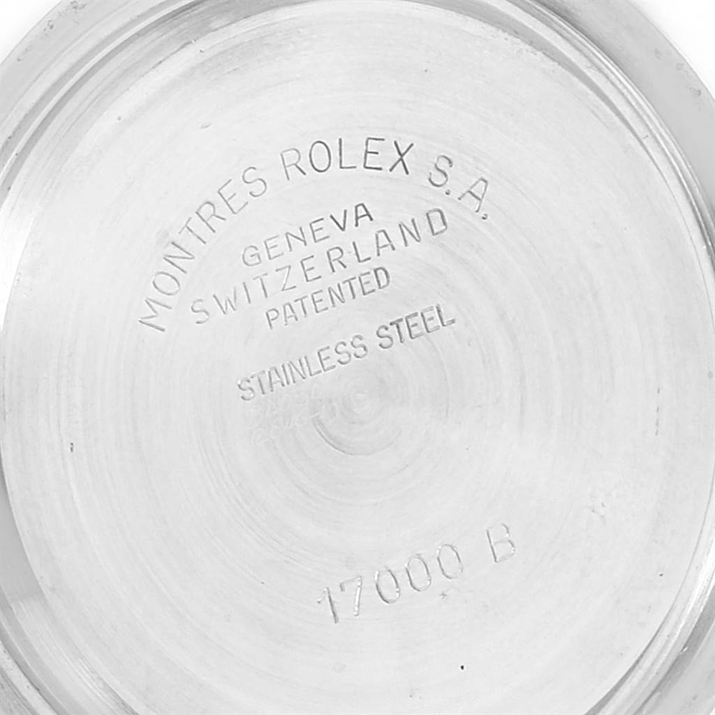 This image shows the engraved back case of a Rolex Oysterquartz 17000 Men's Stainless Steel White Dial 17000 Men's Stainless Steel White Dial watch with model and material details.