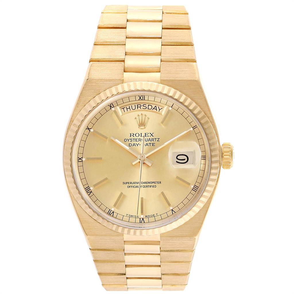 The image shows the front view of the Rolex Oysterquartz 19018 Men's Yellow Gold Champagne Dial 19018 Men's Yellow Gold Champagne Dial Day-Date watch, highlighting its dial, bezel, crown, and bracelet.