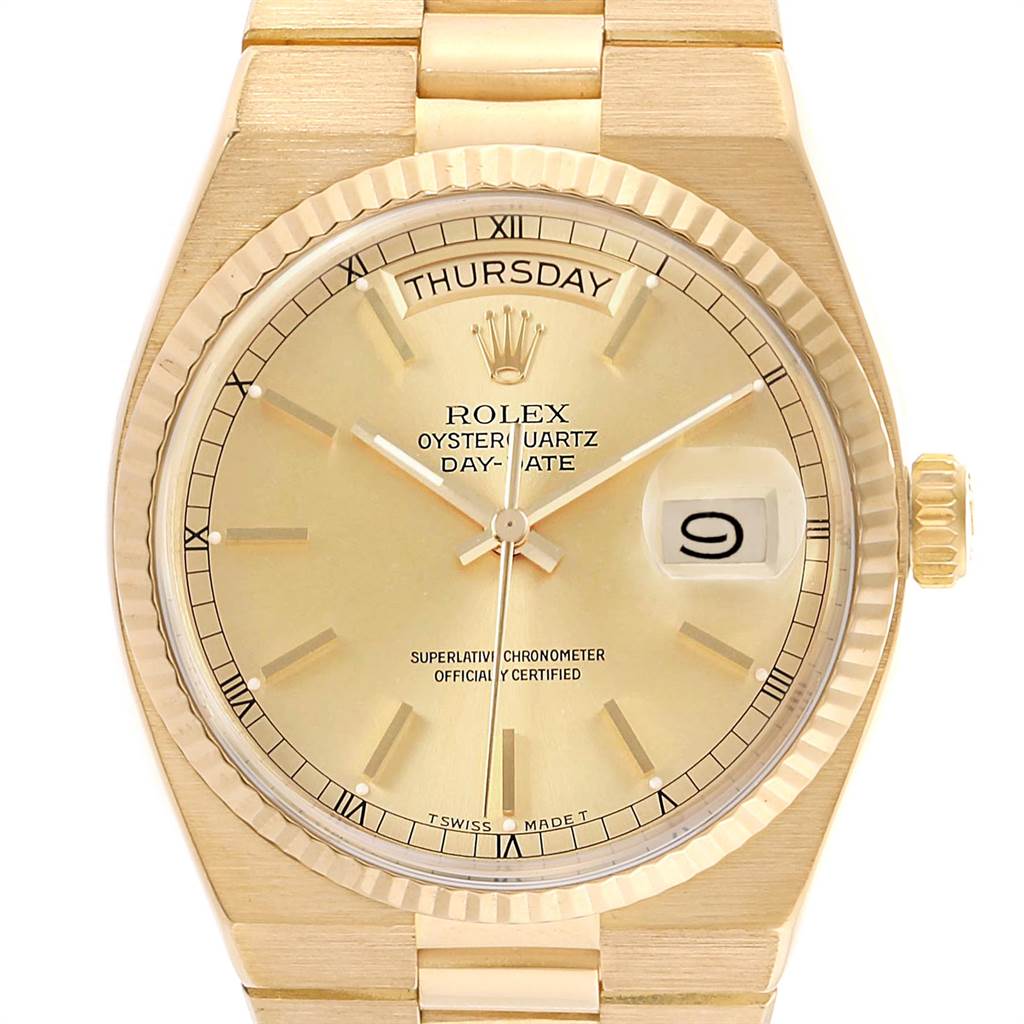 This image shows a frontal view of the Rolex Oysterquartz 19018 Men's Yellow Gold Champagne Dial 19018 Men's Yellow Gold Champagne Dial watch, displaying its dial, bezel, and part of the bracelet.