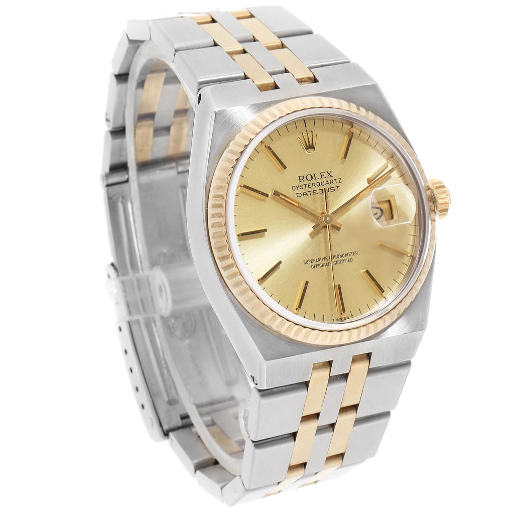 This Rolex Oysterquartz 17013 Men
s Stainless Steel Champagne Dial 17013 Men
s Stainless Steel Champagne Dial watch is angled showing its face, bezel, crown, and two-tone bracelet.