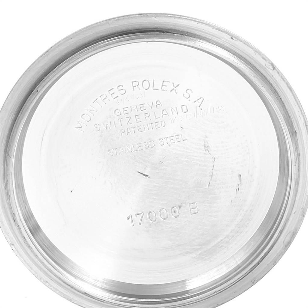 The image shows the inside case back of a Rolex Oysterquartz 17013 Men
s Stainless Steel Champagne Dial 17013 Men
s Stainless Steel Champagne Dial watch, featuring engraved text and model number.