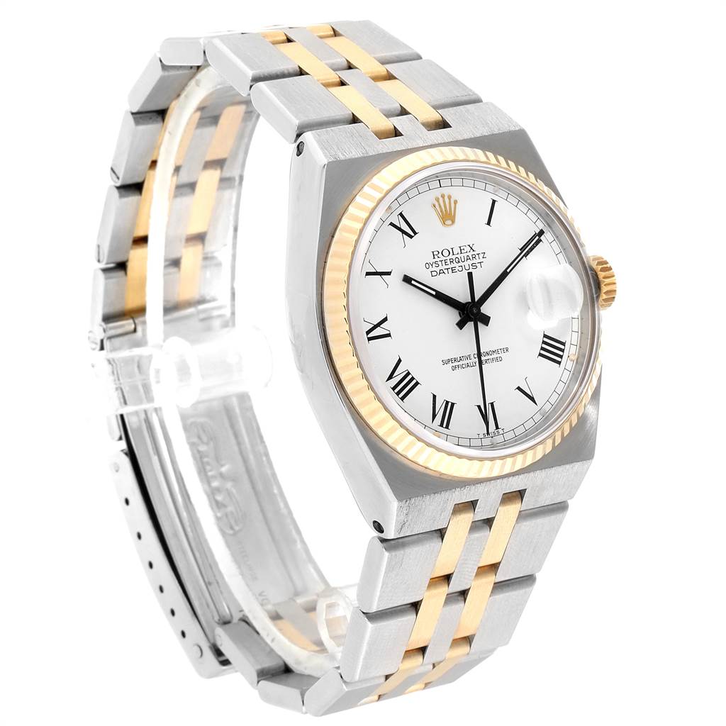 The Rolex Oysterquartz 19220 Men's Steel and Gold (two tone) White Dial 19220 Men's Steel and Gold (two tone) White Dial watch is shown at an angle displaying the face, gold fluted bezel, and stainless steel and gold bracelet.