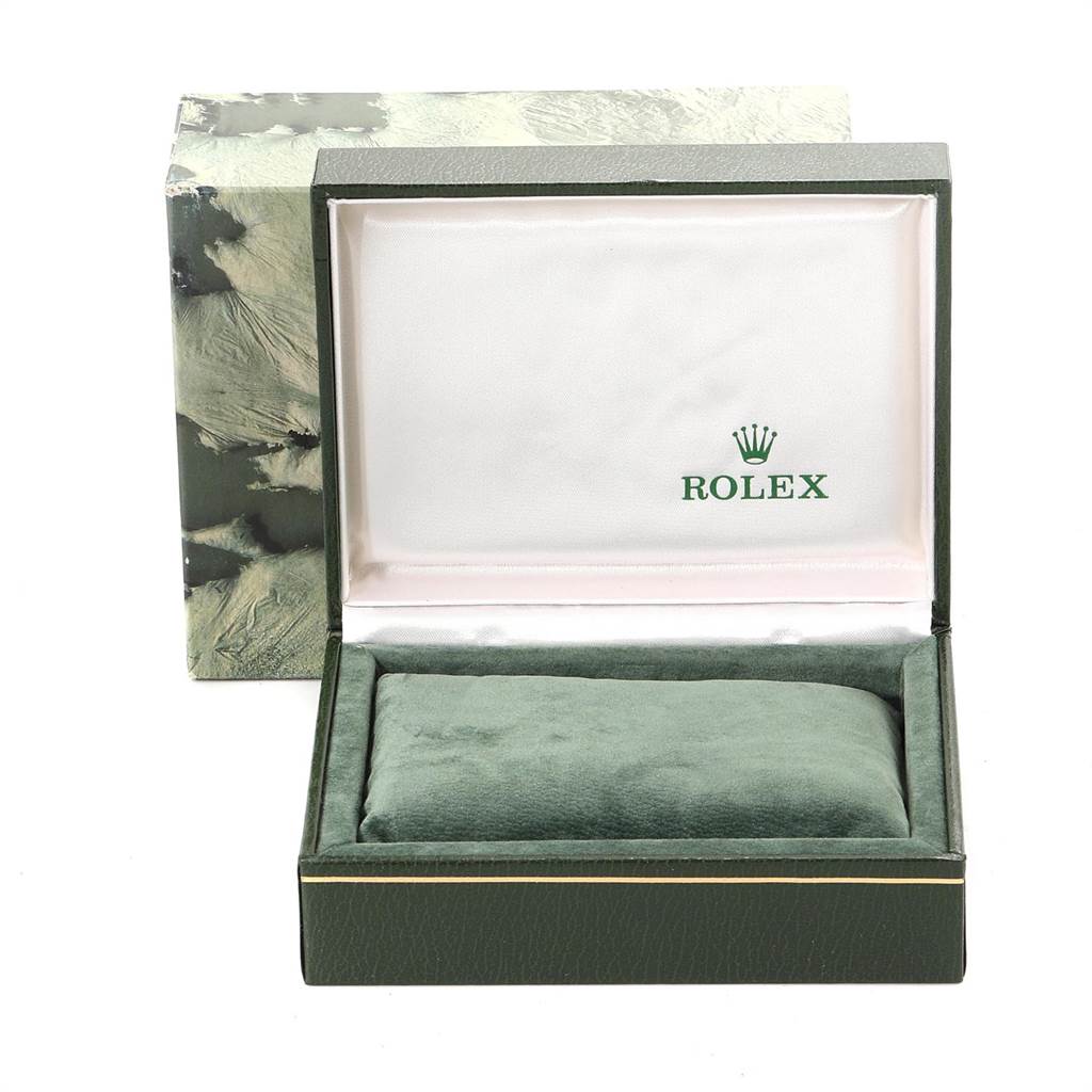 The image shows a green box for a Rolex Oysterquartz 17013 Men's Stainless Steel White Dial 17013 Men's Stainless Steel White Dial watch, with the lid open and the cushion inside.