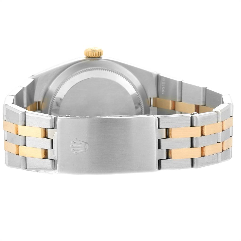 This image shows the back view of the Rolex Oysterquartz 17013 Men's Stainless Steel White Dial 17013 Men's Stainless Steel White Dial watch, featuring its clasp and two-tone bracelet.