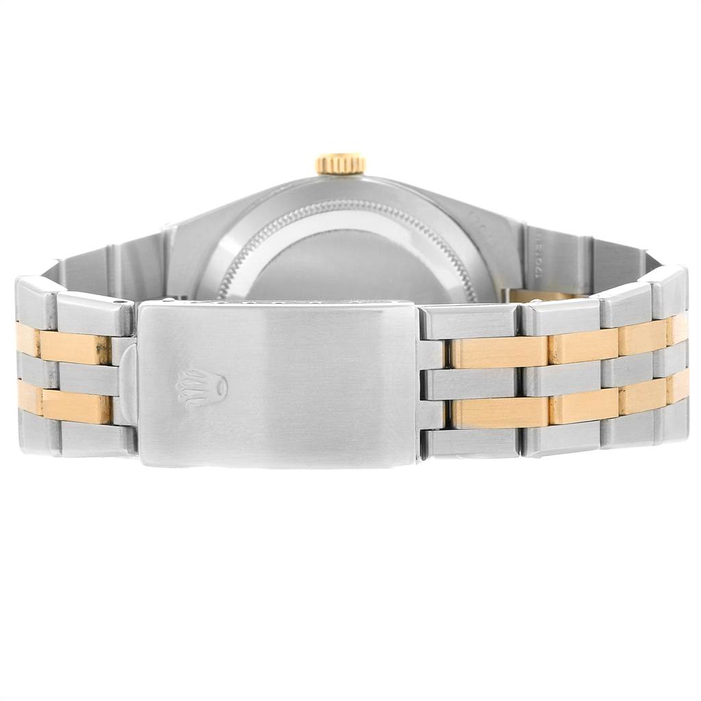 This image shows the back view of a Rolex Oysterquartz 17013 Men
s Stainless Steel Champagne Dial 17013 Men
s Stainless Steel Champagne Dial watch, highlighting the bracelet and clasp.