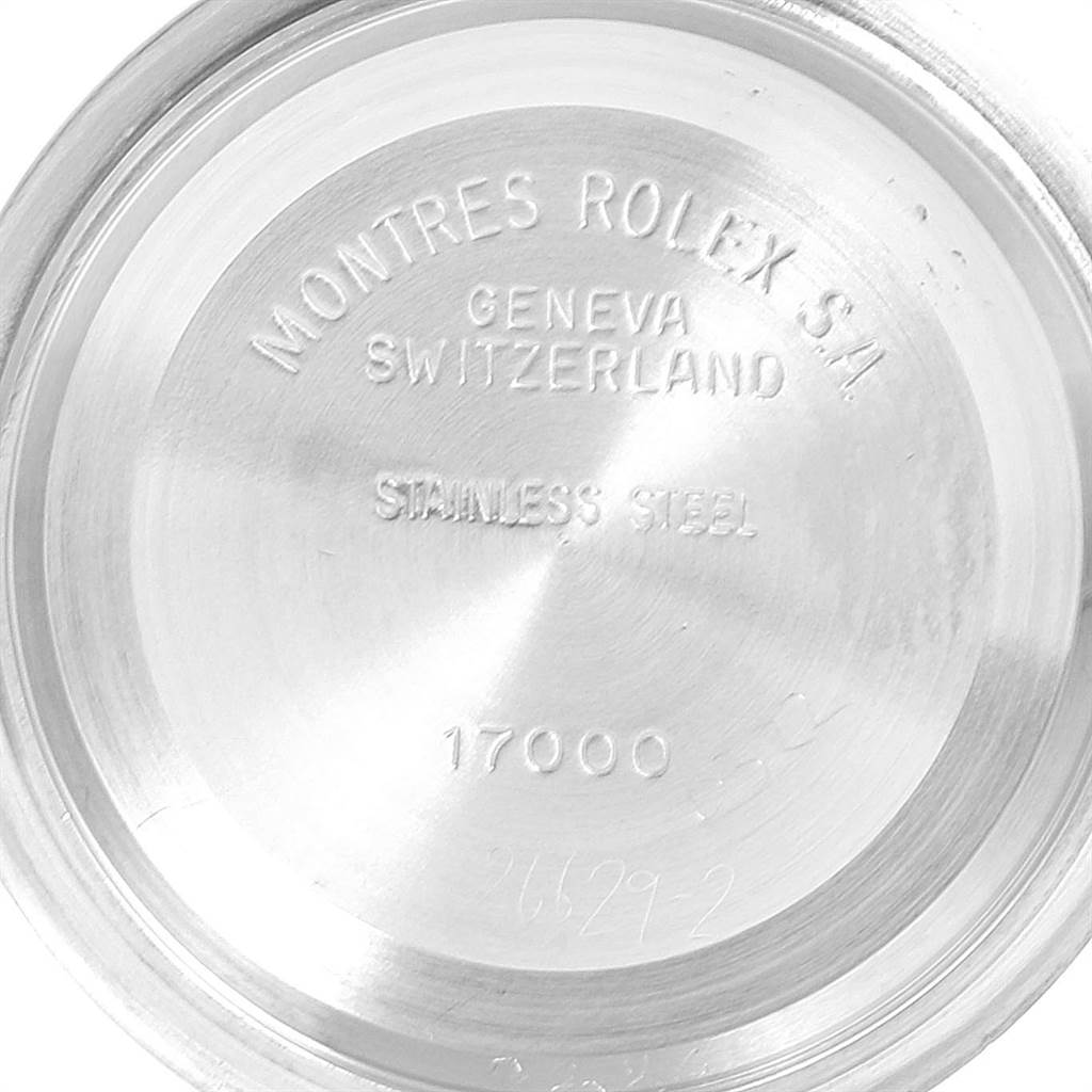 The image shows the inner case back of a Rolex Oysterquartz 17013 Men's Stainless Steel White Dial 17013 Men's Stainless Steel White Dial model, displaying engravings including the brand and model number 17000.