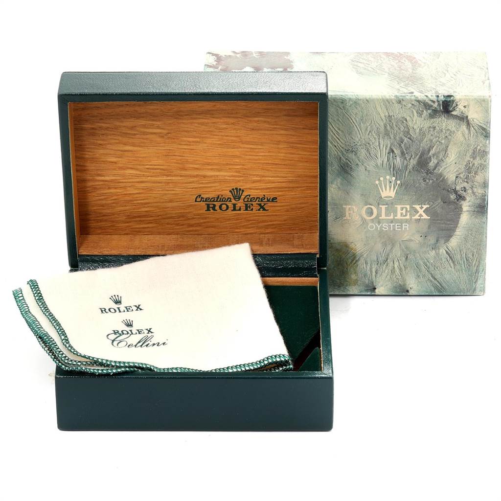 The image shows an open Rolex Oysterquartz 19220 Men's Steel and Gold (two tone) White Dial 19220 Men's Steel and Gold (two tone) White Dial watch box with a cleaning cloth, along with its outer packaging.