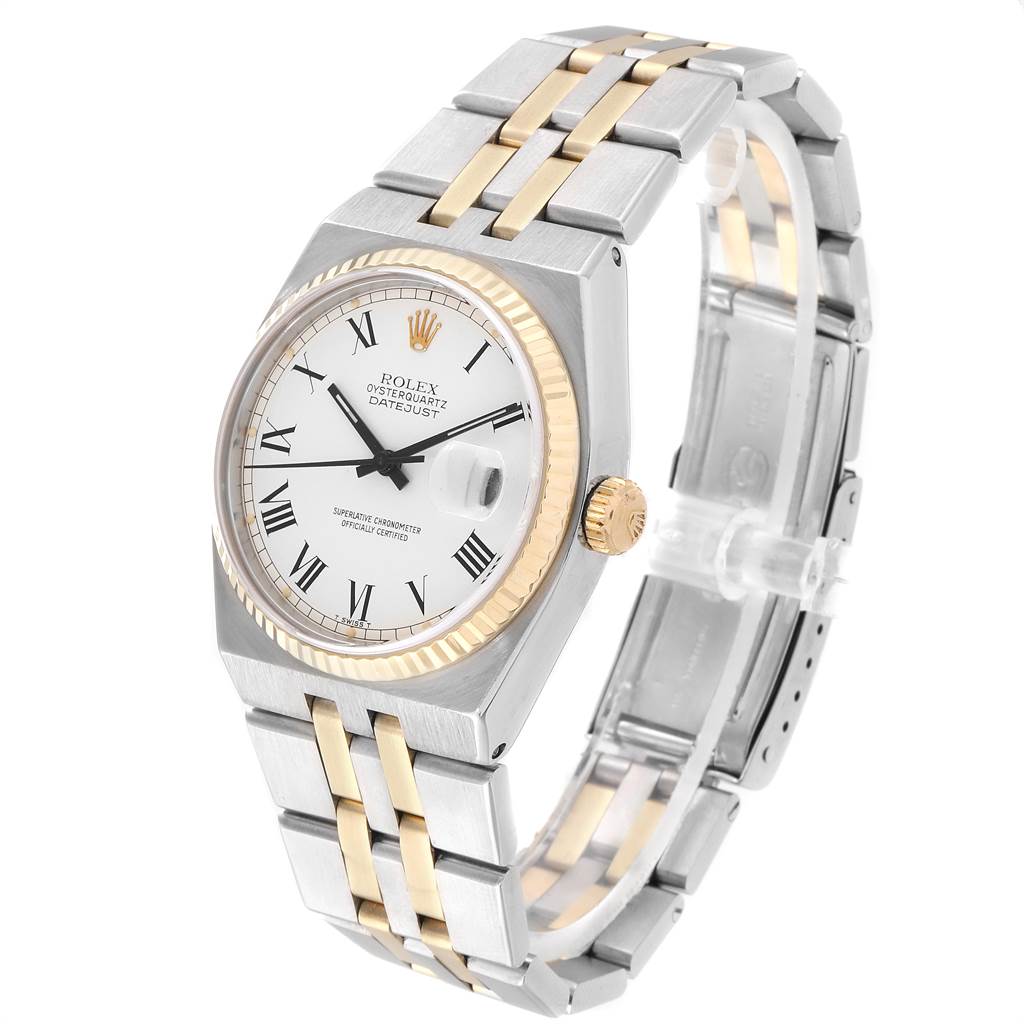 This Rolex Oysterquartz 19220 Men's Steel and Gold (two tone) White Dial 19220 Men's Steel and Gold (two tone) White Dial watch is shown at an angle from the front and slightly to the side, displaying the face, bezel, crown, and bracelet.