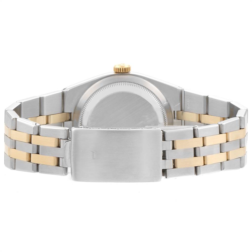 The image shows the back view of a Rolex Oysterquartz 19220 Men's Steel and Gold (two tone) White Dial 19220 Men's Steel and Gold (two tone) White Dial watch, highlighting the bracelet and clasp.
