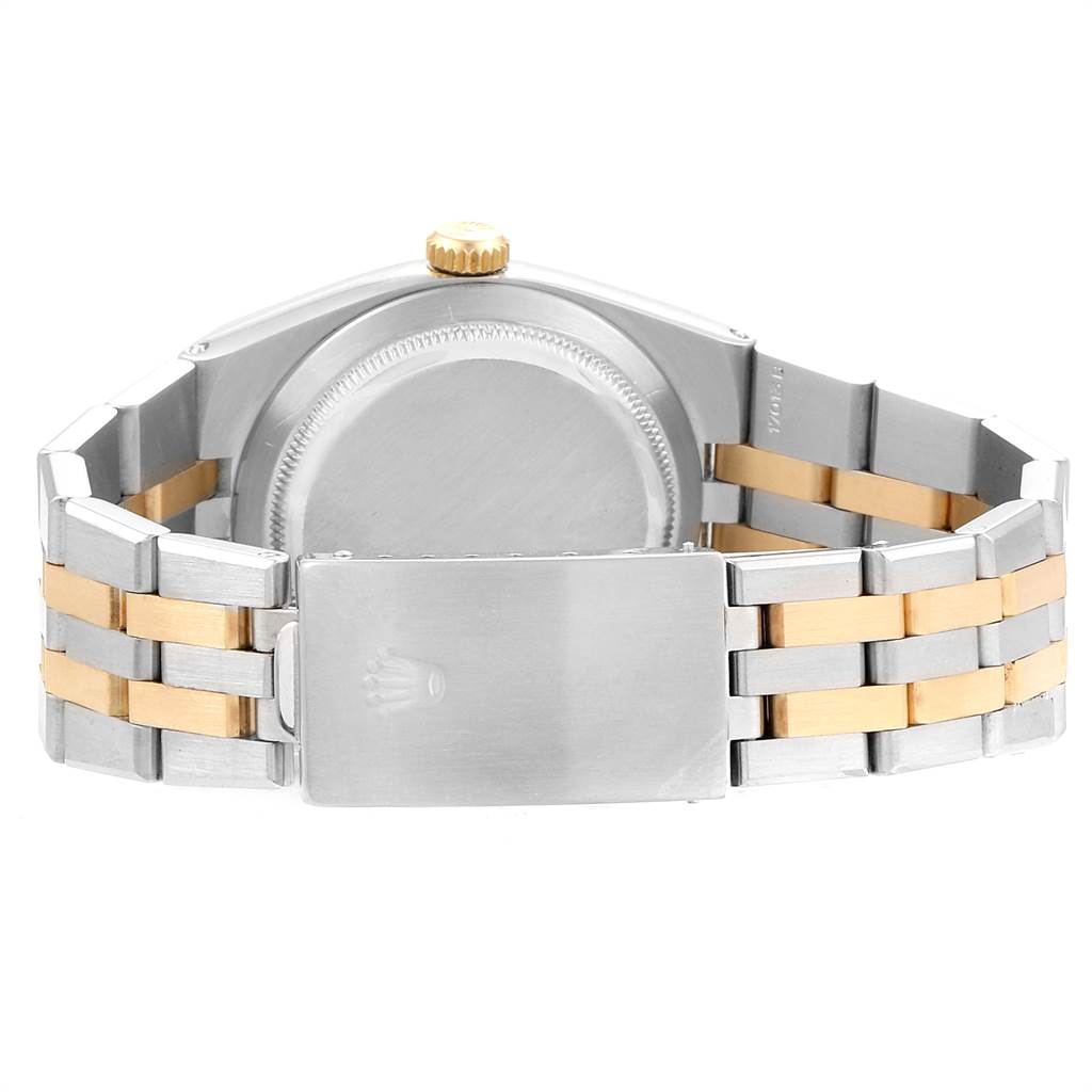 This image shows the back view of the Rolex Oysterquartz 16865 Men's Stainless Steel White Dial 16865 Men's Stainless Steel White Dial watch, highlighting the clasp, bracelet, and case back.