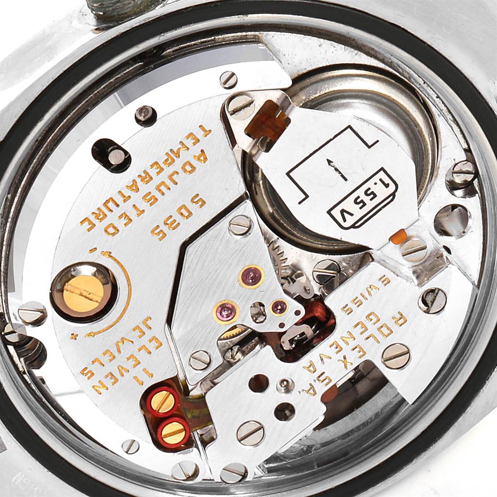 The image shows the close-up inner mechanism of a Rolex Oysterquartz 16865 Men's Stainless Steel White Dial 16865 Men's Stainless Steel White Dial model watch, highlighting the automatic movement components.
