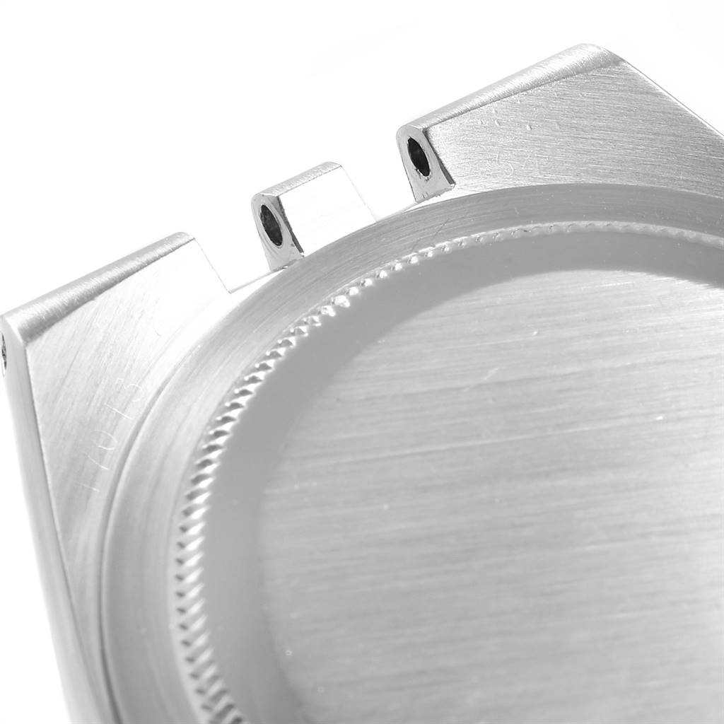 This image shows a close-up of the lugs and case back of a Rolex Oysterquartz 17013 Men's Stainless Steel Champagne Dial 17013 Men's Stainless Steel Champagne Dial watch viewed from an angle.