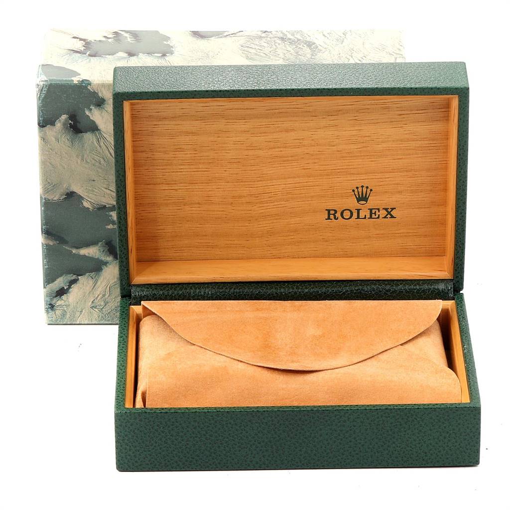 The image shows an open Rolex Oysterquartz 17013 Men's Stainless Steel Champagne Dial 17013 Men's Stainless Steel Champagne Dial watch box and a suede pouch inside it.