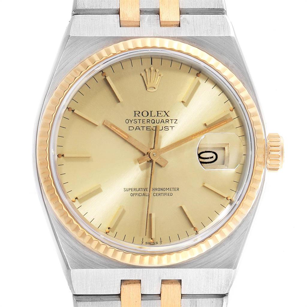 The image shows a frontal view of the Rolex Oysterquartz 17013 Men's Stainless Steel Champagne Dial 17013 Men's Stainless Steel Champagne Dial Datejust watch displaying the dial, bezel, crown, and part of the bracelet.
