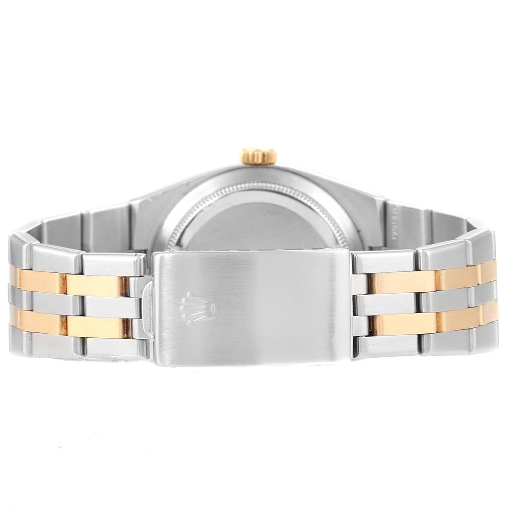 This image shows the backside and clasp of a Rolex Oysterquartz 17013 Men
s Stainless Steel Silver Dial 17013 Men
s Stainless Steel Silver Dial watch, featuring a two-tone metal band.