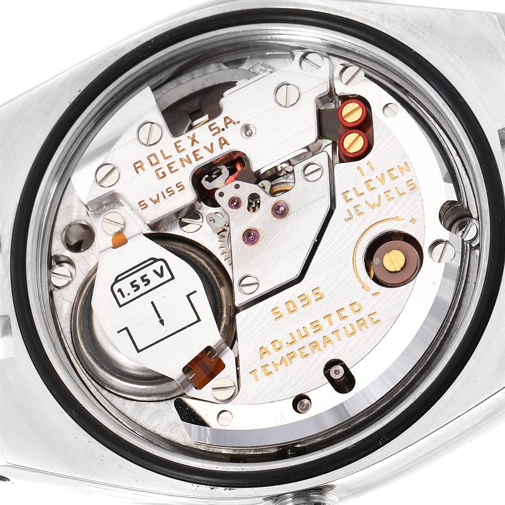 This close-up image shows the internal mechanism and movement of a Rolex Oysterquartz 17013 Men's Stainless Steel Champagne Dial 17013 Men's Stainless Steel Champagne Dial watch.