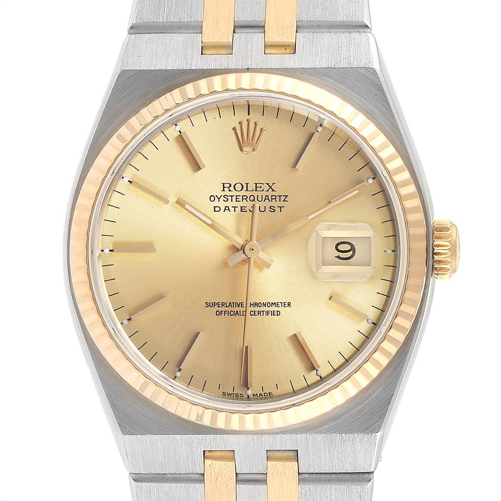 The image shows a front view of a Rolex Oysterquartz 17013 Men's Stainless Steel Champagne Dial 17013 Men's Stainless Steel Champagne Dial Datejust watch, highlighting the dial, hands, crown, and part of the bracelet.