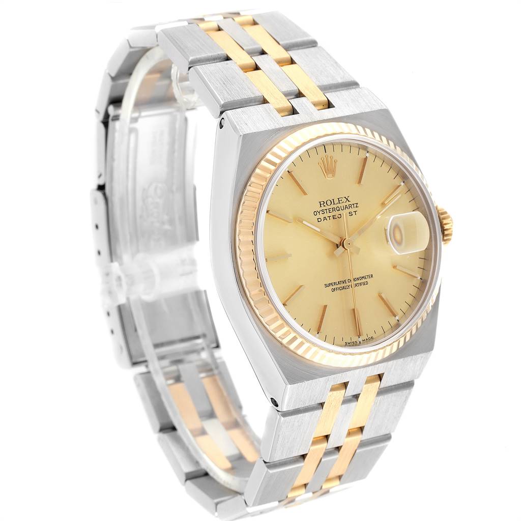 The Rolex Oysterquartz 17013 Men's Stainless Steel Champagne Dial 17013 Men's Stainless Steel Champagne Dial watch is shown at a three-quarter angle, highlighting its gold and silver bracelet, bezel, and face.