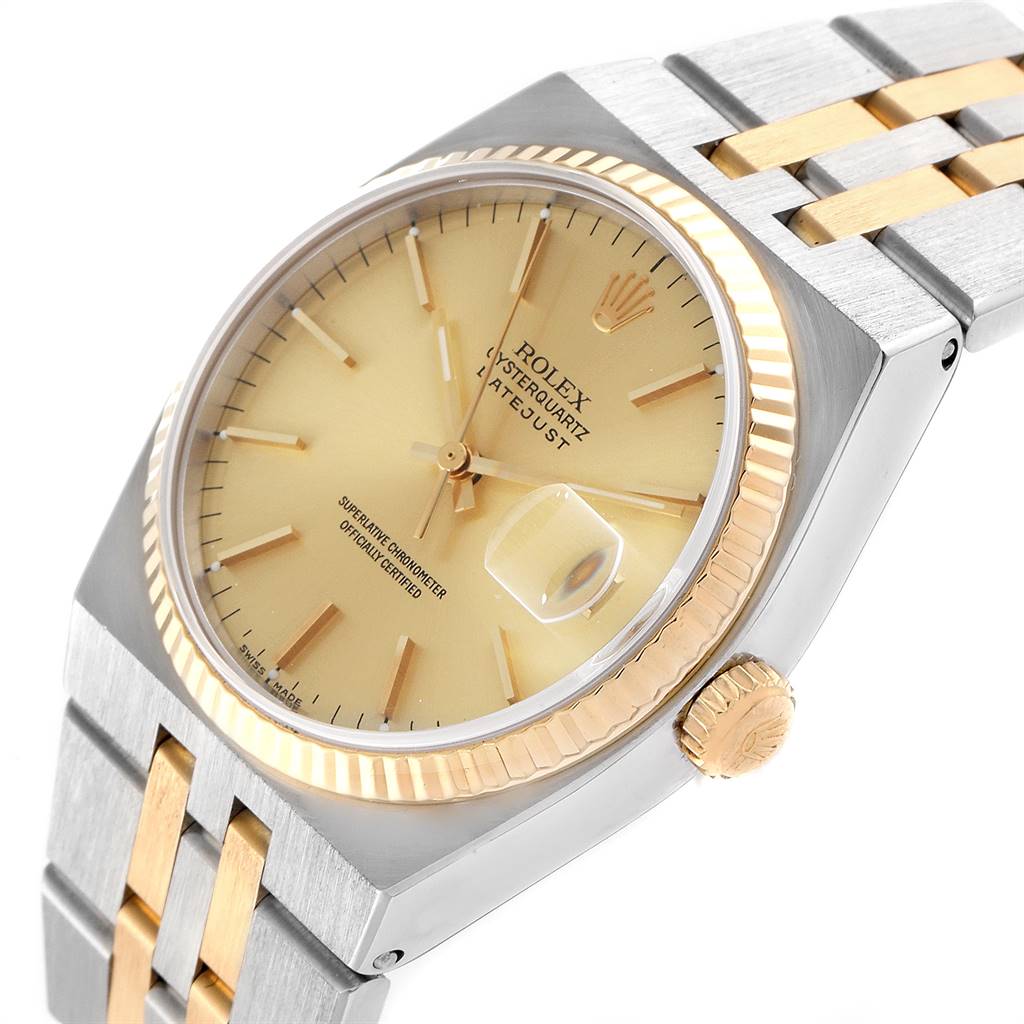 This image shows a close-up and angled view of the face, bezel, crown, and bracelet of a Rolex Oysterquartz 17013 Men's Stainless Steel Champagne Dial 17013 Men's Stainless Steel Champagne Dial watch.