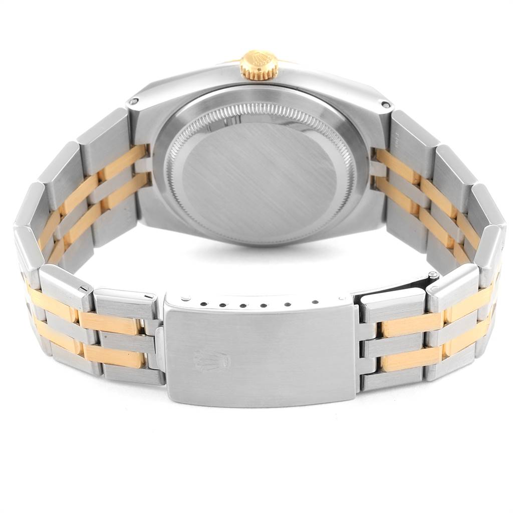 The image shows the back view of a Rolex Oysterquartz 17013 Men's Stainless Steel Champagne Dial 17013 Men's Stainless Steel Champagne Dial watch, highlighting the case, bracelet, and clasp.