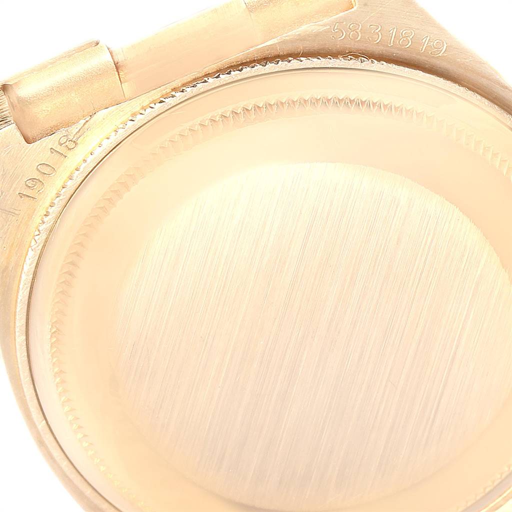 The image shows a close-up of the case back and lugs of the Rolex Oysterquartz 19018 Men's Yellow Gold Champagne Dial 19018 Men's Yellow Gold Champagne Dial watch model.