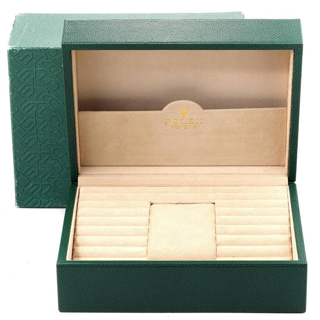 The image shows an opened Rolex Oysterquartz 19018 Men's Yellow Gold Champagne Dial 19018 Men's Yellow Gold Champagne Dial watch box with a green exterior and beige interior.