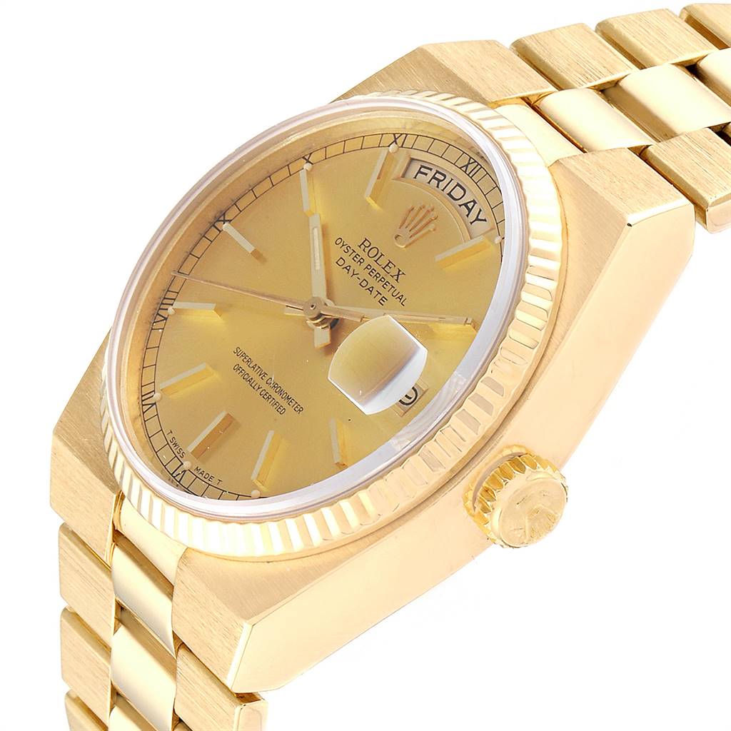 This image shows a close-up, side angle of a Rolex Oysterquartz 19018 Men's Yellow Gold Champagne Dial 19018 Men's Yellow Gold Champagne Dial watch, highlighting the face, crown, and bracelet.