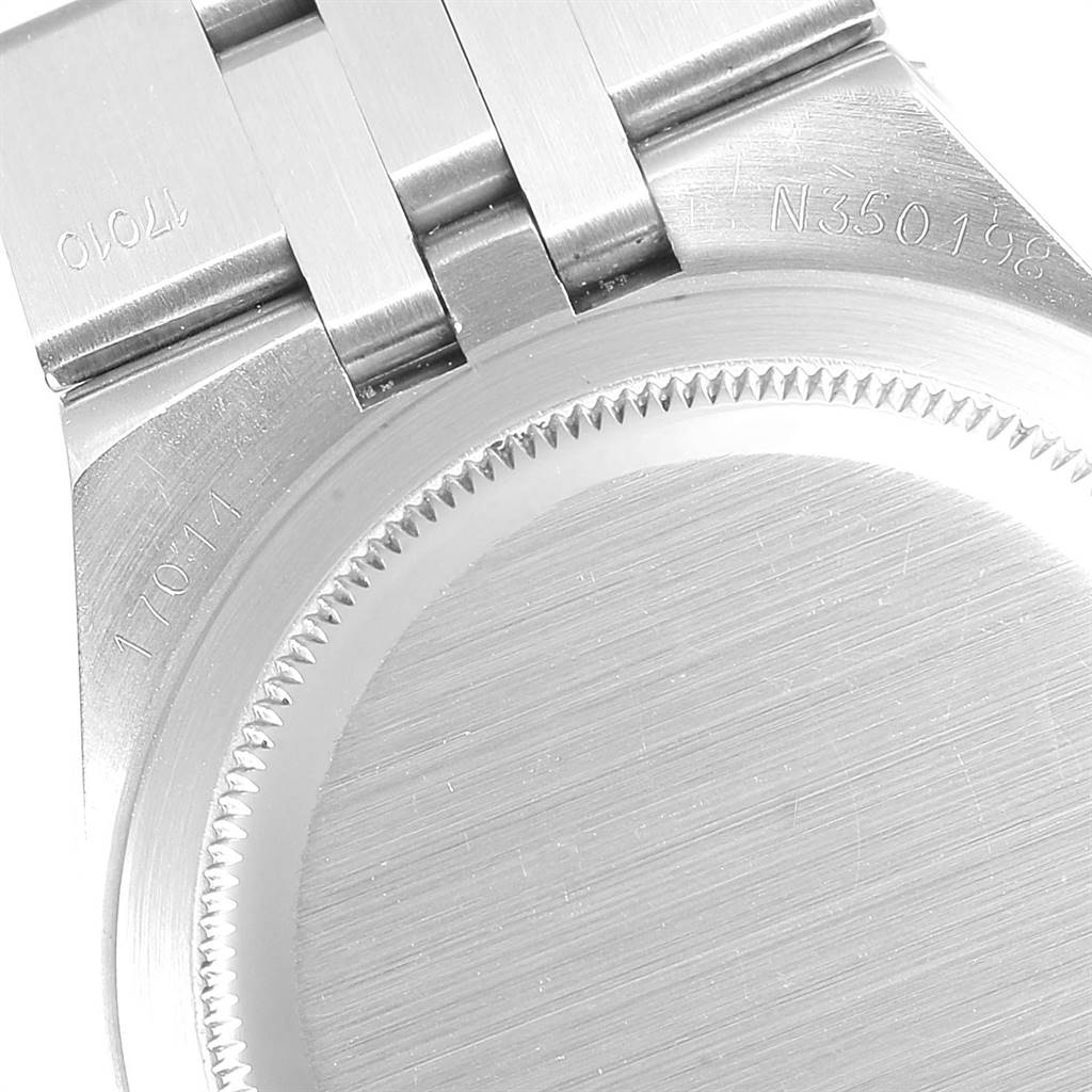 This image shows the back case and part of the bracelet of a Rolex Oysterquartz 17014 Men
s Stainless Steel Silver Dial 17014 Men
s Stainless Steel Silver Dial watch.