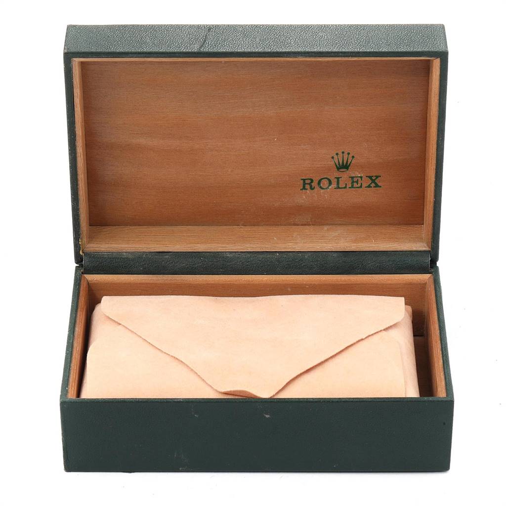 This is an open Rolex watch box for the Oysterquartz model, partially showing the interior.