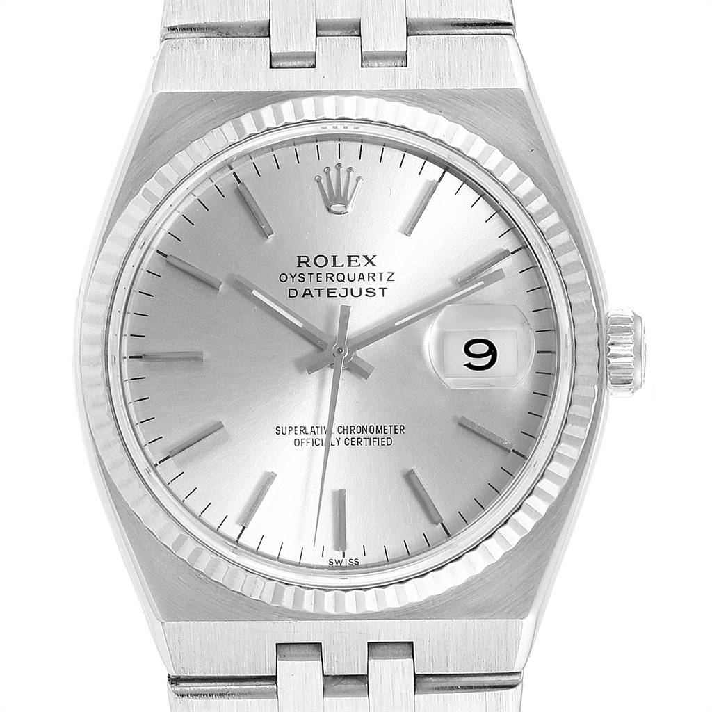 The image shows a front view of a Rolex Oysterquartz 17014 Men
s Stainless Steel Silver Dial 17014 Men
s Stainless Steel Silver Dial Datejust watch, highlighting the watch face, hands, date window, and part of the bracelet.