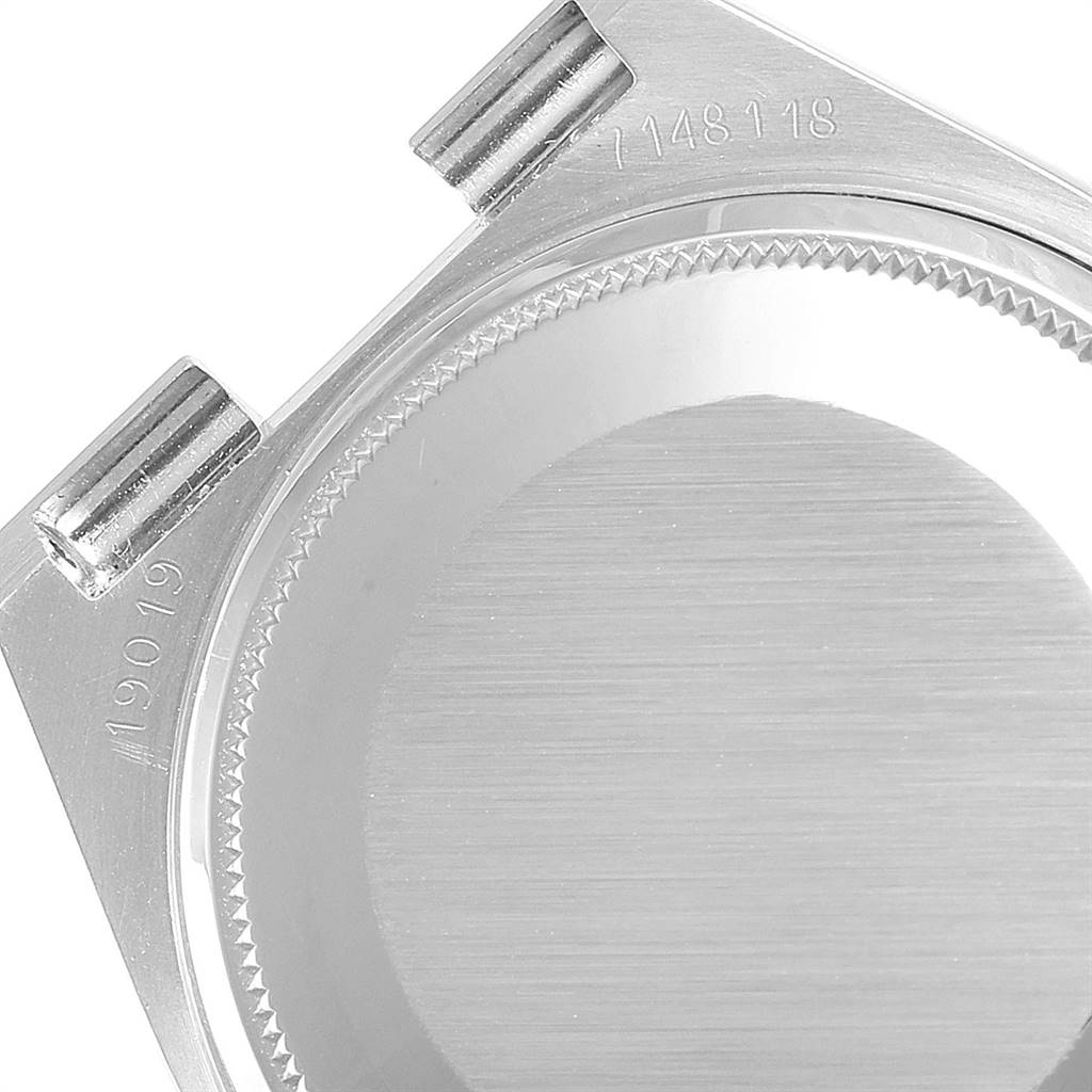 The image shows the case back and lugs of a Rolex Oysterquartz 19019 Men
s White Gold Silver Dial 19019 Men
s White Gold Silver Dial watch at an angle capturing the serial numbers.