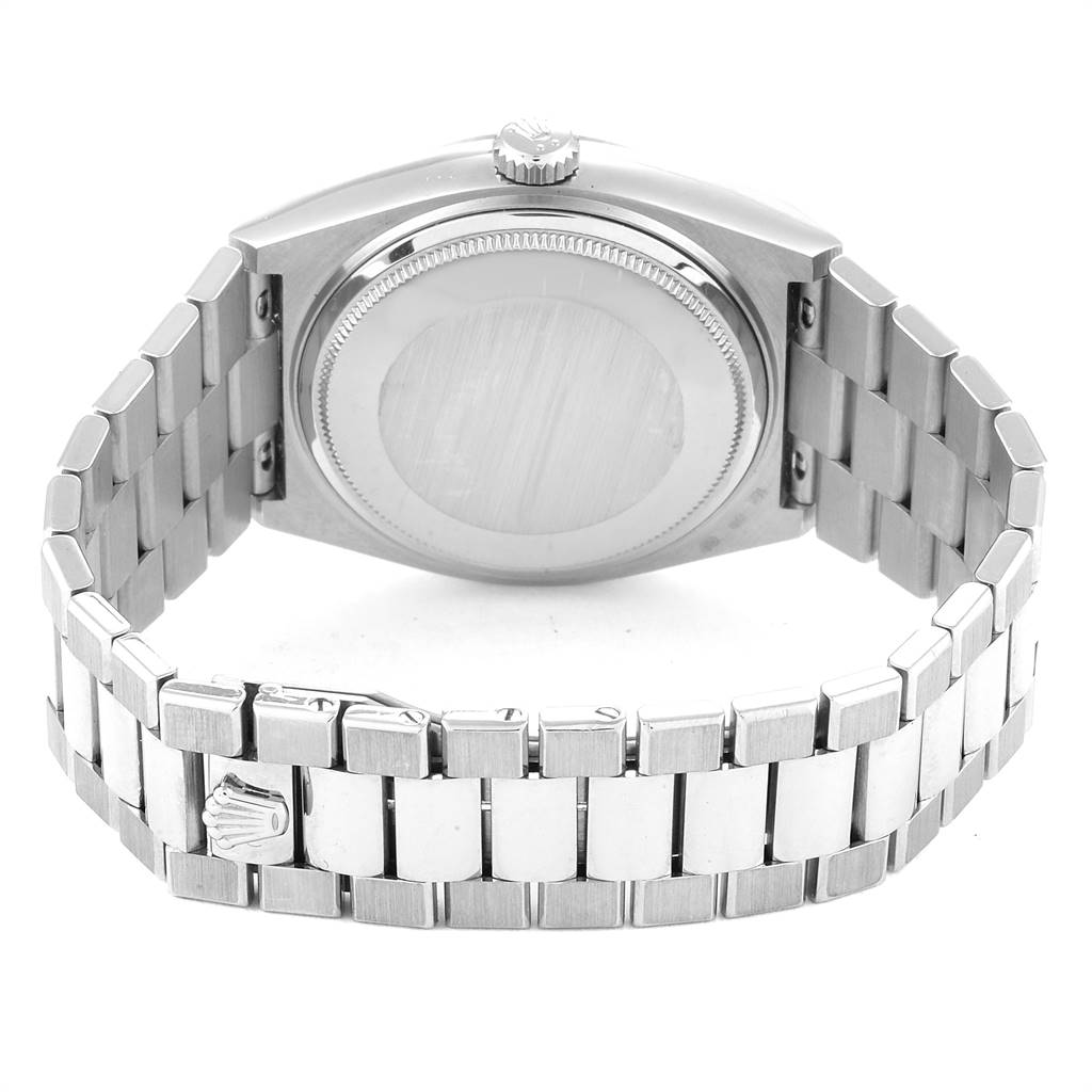 This image shows the back case, crown, and metal bracelet of a Rolex Oysterquartz 19019 Men
s White Gold Silver Dial 19019 Men
s White Gold Silver Dial watch from a rear angle.