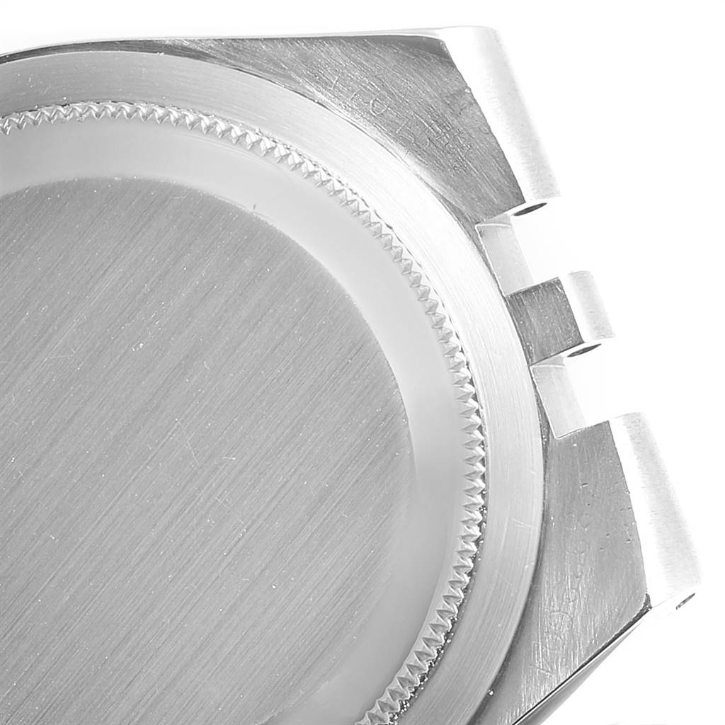 The image shows a close-up of the backside and lugs of a Rolex Oysterquartz 19220 Men's Steel and Gold (two tone) White Dial 19220 Men's Steel and Gold (two tone) White Dial watch case.