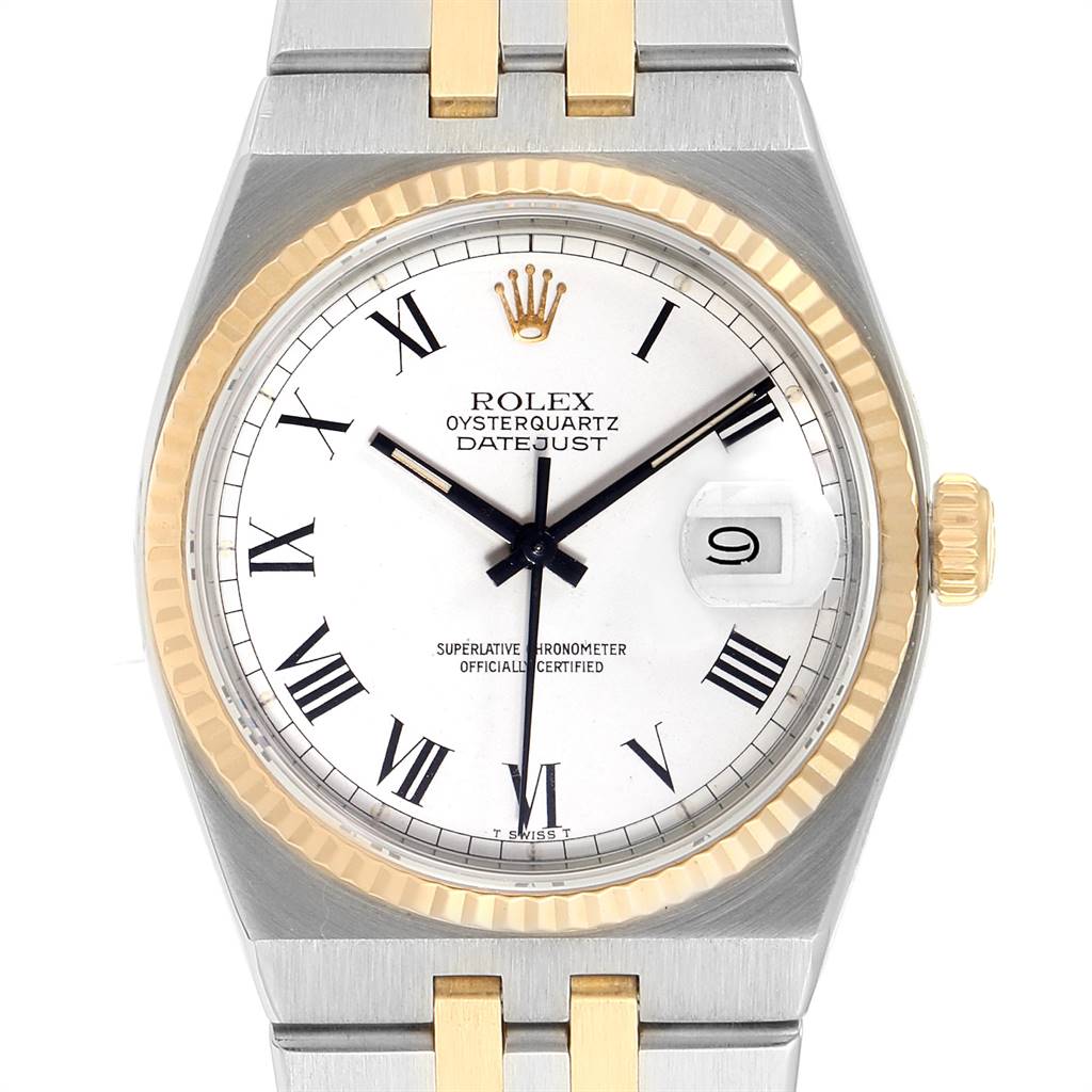This image shows a front view of a Rolex Oysterquartz 19220 Men's Steel and Gold (two tone) White Dial 19220 Men's Steel and Gold (two tone) White Dial Datejust watch, highlighting the face, bezel, crown, and part of the bracelet.
