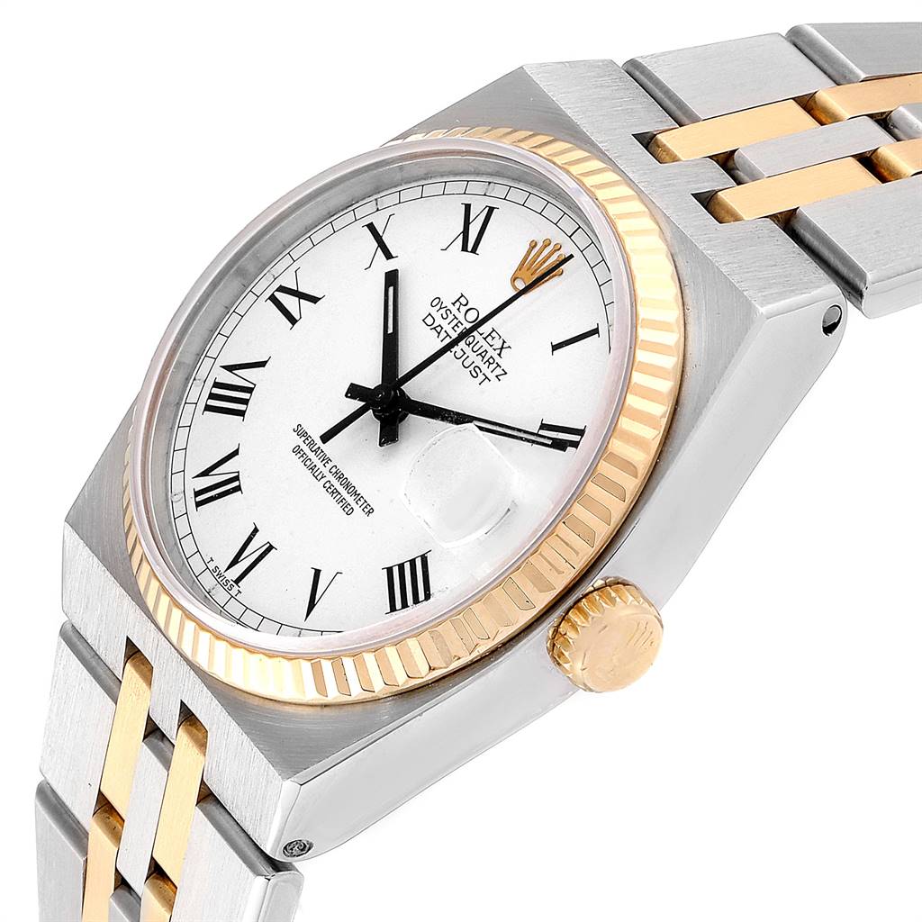 The image shows a close-up angle of a Rolex Oysterquartz 19220 Men's Steel and Gold (two tone) White Dial 19220 Men's Steel and Gold (two tone) White Dial watch, highlighting the face, bezel, crown, and part of the bracelet.