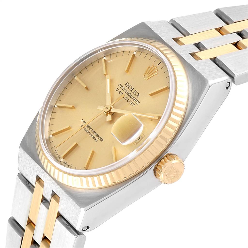 The Rolex Oysterquartz 17013 Men
s Stainless Steel Champagne Dial 17013 Men
s Stainless Steel Champagne Dial watch is shown at a three-quarter angle, highlighting the watch face, crown, and two-tone bracelet.